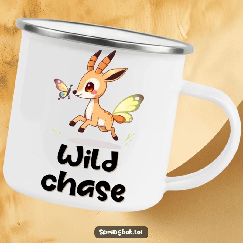 Funny springbok camping mug with a playful character chasing a stylized butterfly, perfect for outdoor adventures.