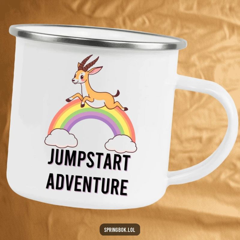 Funny camping mug showing a springbok leaping over a rainbow, bringing whimsical charm to outdoor adventures.