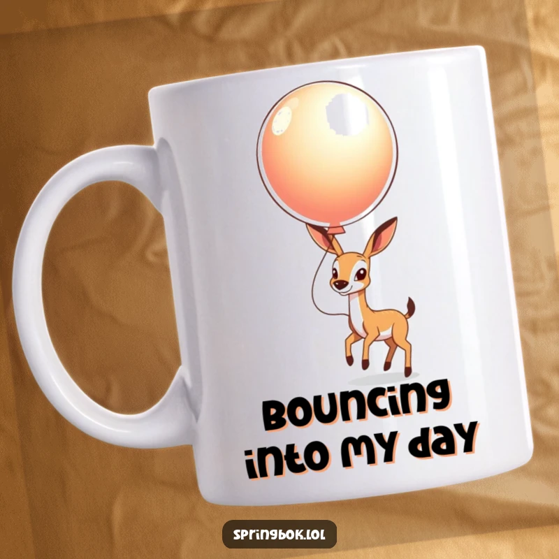 Funny Springbok Balloon Mug: A springbok gleefully bouncing a large, shiny balloon high in the air with delight.