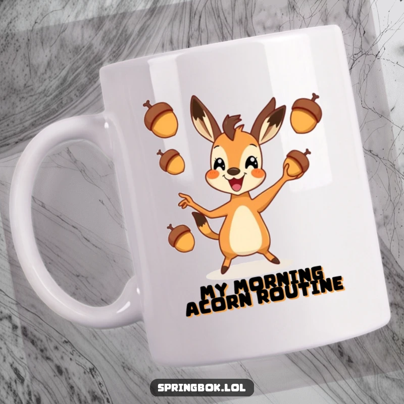 Funny springbok mug with a cheerful springbok gleefully juggling three tiny acorns with impressive dexterity.