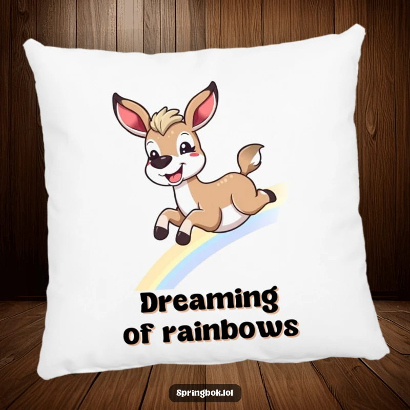 Funny springbok rainbow pillow, sliding down a rainbow with a grin, ideal for a funny gift and cozy decor.