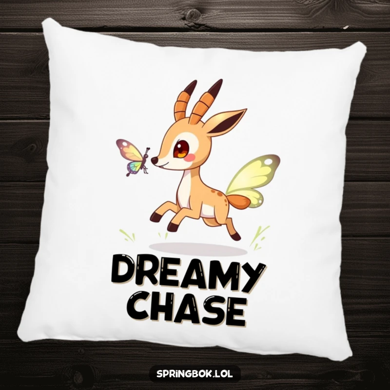 Funny springbok pillow featuring a playful character chasing a stylized butterfly, offering comfort and a sense of lighthearted joy.
