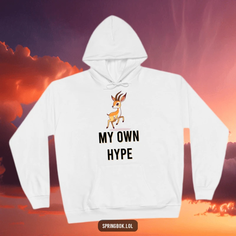 Funny springbok hoodie shows a playful springbok character chasing its shadow, perfect for cozy and humorous wear.