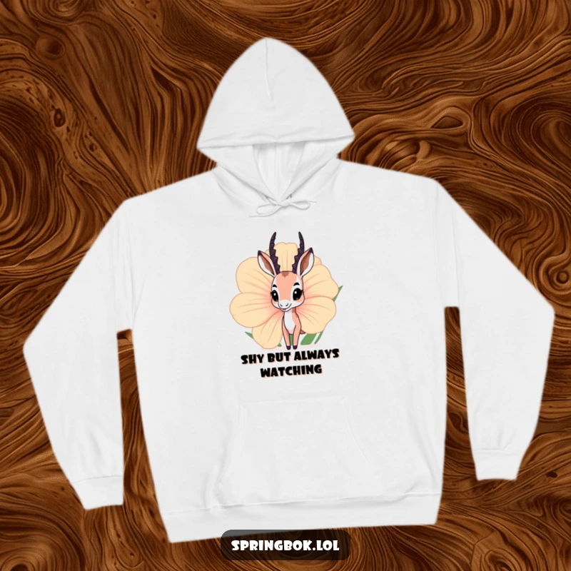 Funny springbok hoodie depicting a curious springbok peeking from behind an oversized flower, offering cozy and whimsical comfort.