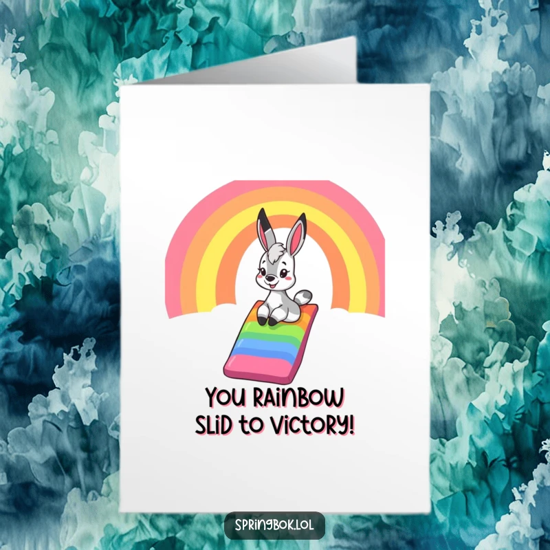 Funny Free Printable Congratulations Card: a springbok joyfully sliding down a colorful rainbow chute, celebrating a big achievement.