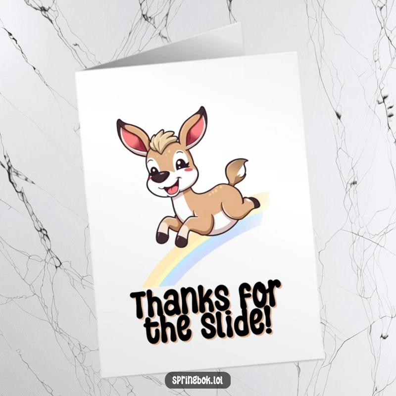 Funny Free Printable Thank You Card: A springbok with a huge grin slides down a rainbow, spreading thanks.