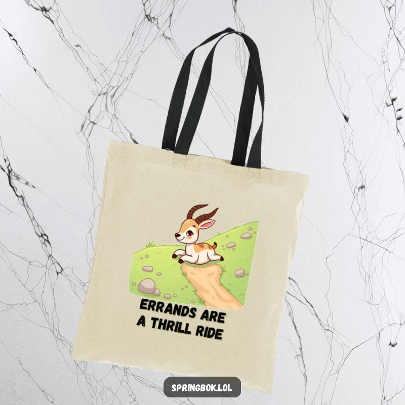 Funny springbok tote bag showing a laughing springbok sliding down a grassy hill on its belly, great for carrying essentials.