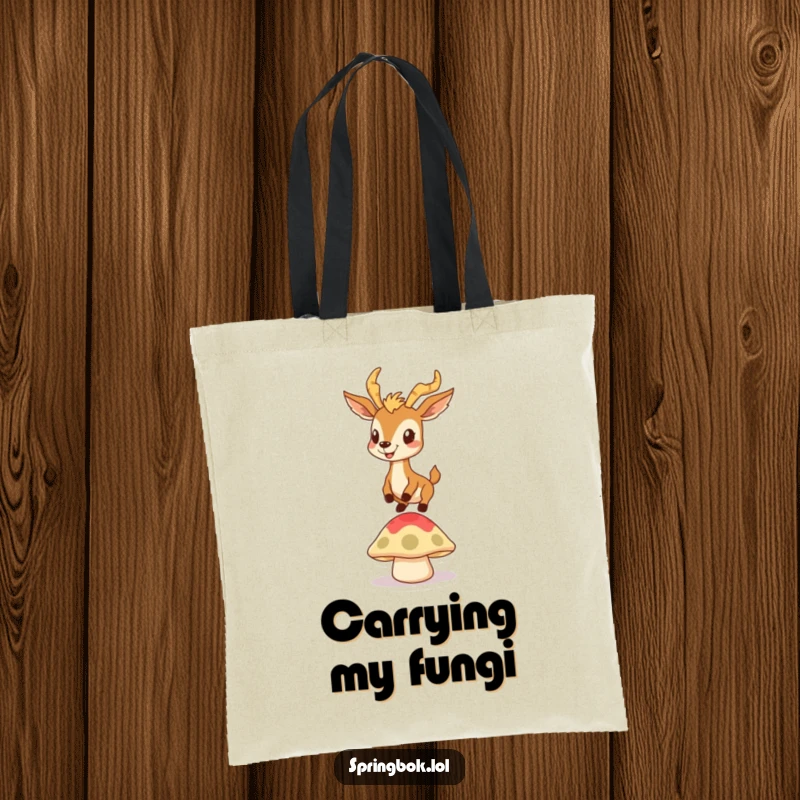 Funny tote bag showing a springbok with a goofy grin bouncing on a mushroom cap, a humorous and practical accessory.