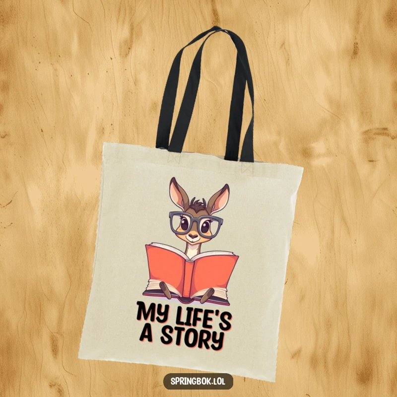 Funny Springbok Glasses Tote Bag: Springbok with oversized glasses reading a large book, perfect for carrying essentials.